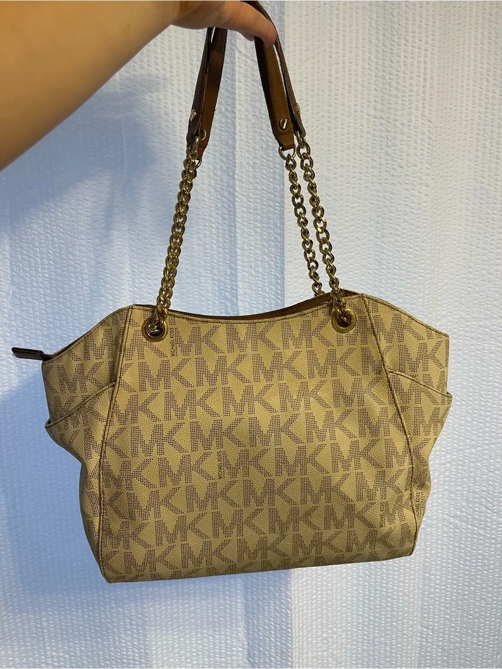 39. Rehab, Michael Kors purse.